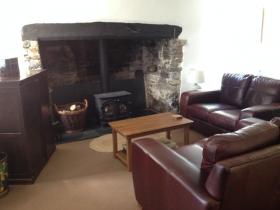 The lounge at East Titchberry Farm Cottage, Hartland - cosy self catering