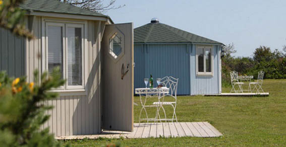 Coastal Cabins - the finest glamping in luxurious, wooden cabins set generously on a 3 acre lakeside site